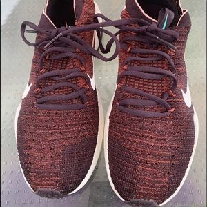 Nike, red women’s running shoes size 8